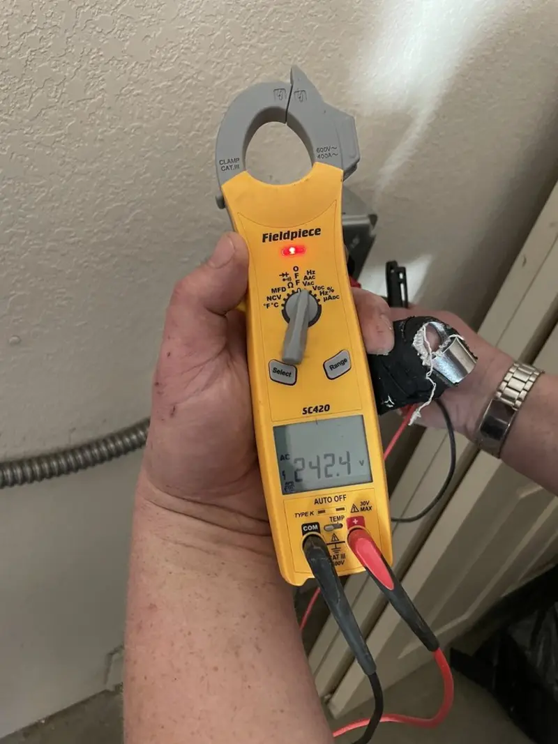 Voltage testing with clamp meter during Generator Installation in Bay City